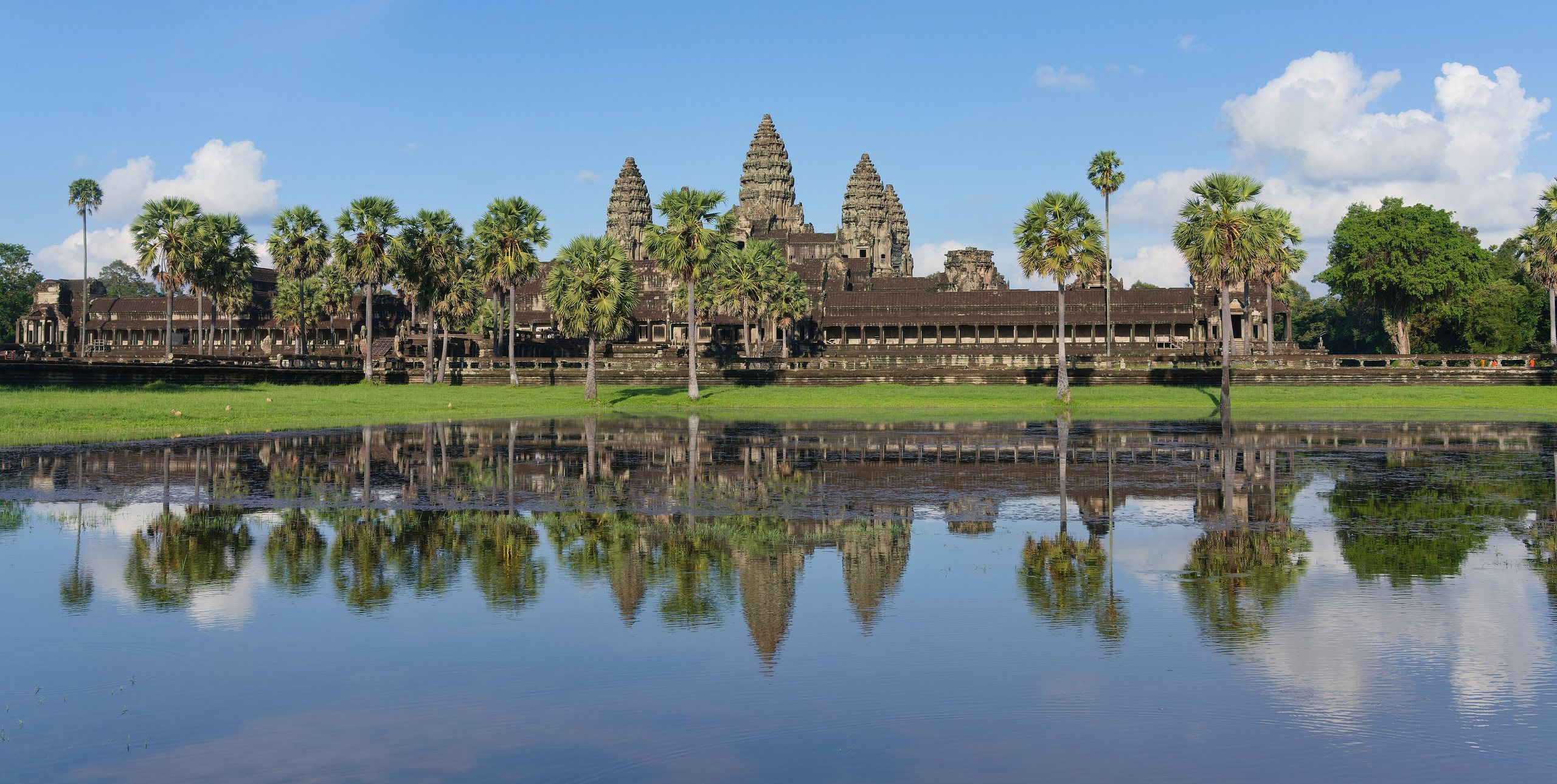 A traveller planning a South East Asia trip with a map